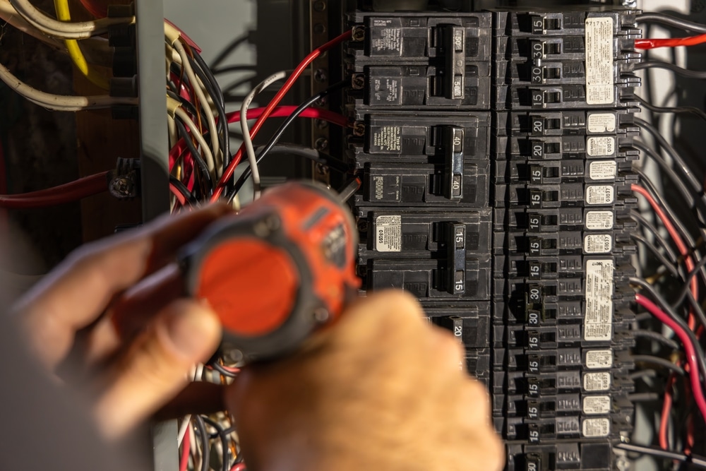 Electrician,Is,Installing,An,Electrical,Circuit,Breaker,In,A,Power