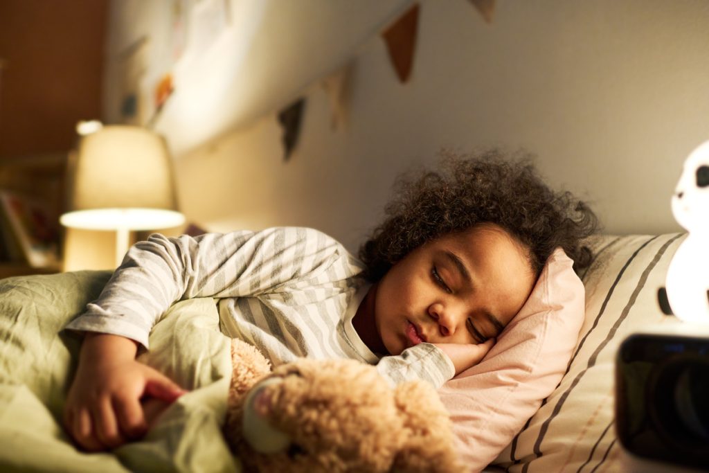 boy sleeping in bed